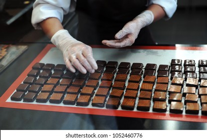 Hands Of Worker Making The Chocolate In The Factory.