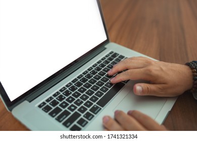 Hands Working With Laptop - Negative Space White Display, Shallow Depth Of Field.