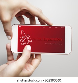 Hands working on digital device network graphic overlay