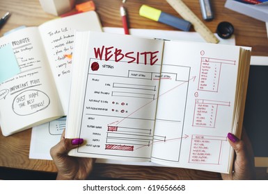 Hands working on notebook network graphic overlay on desk - Powered by Shutterstock - Get 15% off with code: PIKWIZARD15
