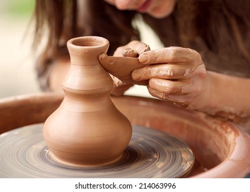 Hands Working On Pottery Wheel