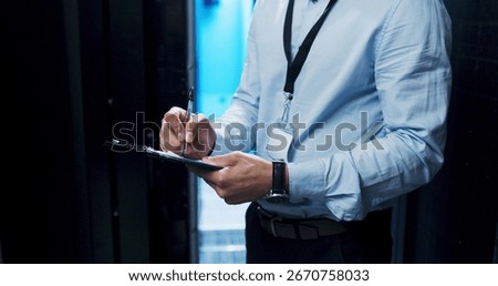 Hands, writing and clipboard for programming in server room, coding or IT solution at company. Person, cybersecurity and system assessment with notes, report or information technology for maintenance