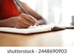 Hands, writing and notes of ideas in planner with schedule for university, research or class. Person, planning and reminder in calendar with deadline info or creative solution to college project