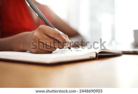 Hands, writing and notes of ideas in planner with schedule for university, research or class. Person, planning and reminder in calendar with deadline info or creative solution to college project