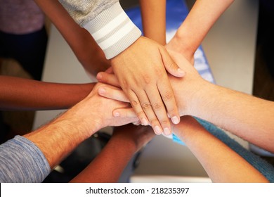 Hands From Young People Of Different Races Joined Together