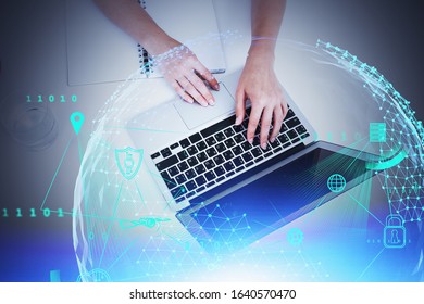 Hands of young woman using laptop in office with double exposure of creative big data interface. Concept of hi tech in education. Toned image
