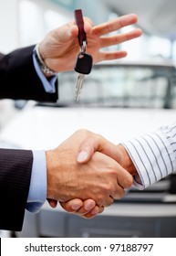 Handshake After Buying A Car And Handling Keys