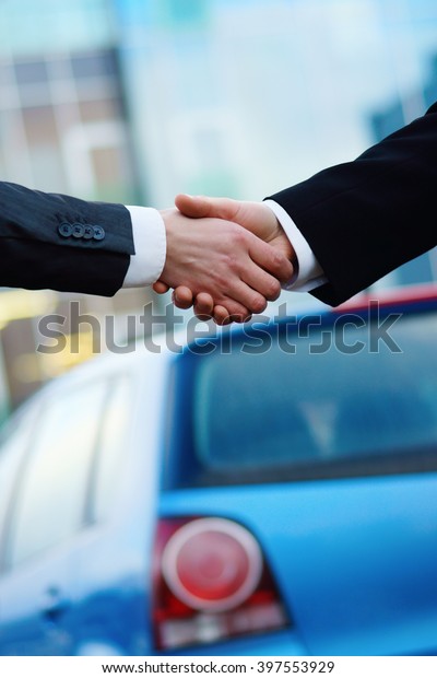 Handshake in auto show or\
salon