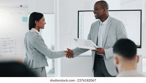 Handshake, award and success with business people in office for winner, support or photographer. Certificate, thank you and achievement with employees in engineering firm for partnership or well done - Powered by Shutterstock