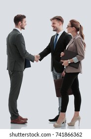 Handshake Between Business People Isolated On White