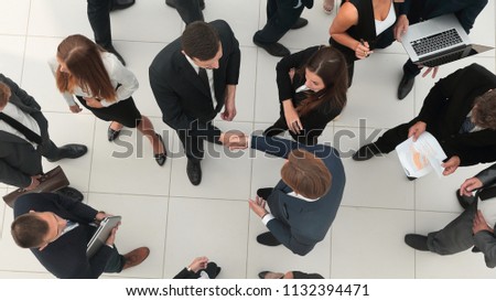 Handshake between competitors before the start of business negot