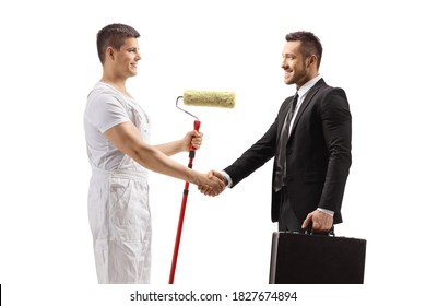 Handshake between a painter and a businessman isolated on white background