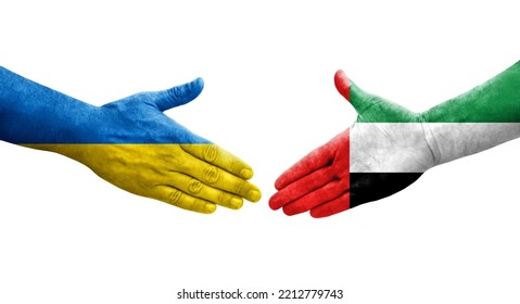Handshake between UAE and Ukraine flags painted on hands, isolated transparent image.