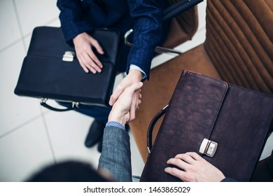 Handshake Of Business Partners Before Starting The Discussion Of A New Treaty