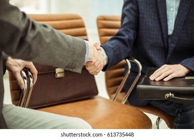 Handshake Of Business Partners Before Starting The Discussion Of A New Treaty