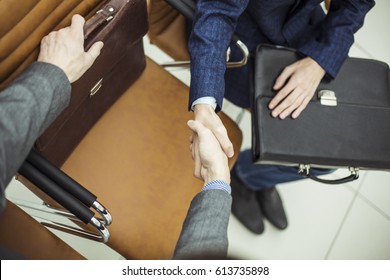 Handshake Of Business Partners Before Starting The Discussion Of A New Treaty