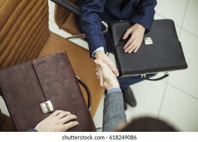 Handshake Of Business Partners Before Starting The Discussion Of A New Treaty