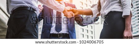 handshake of business People Colleagues Teamwork Meeting .Hold hand and shaking hand in city