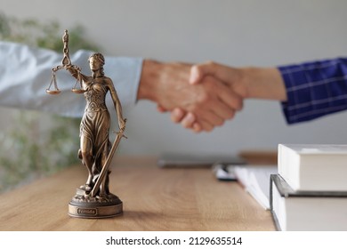 Handshake Of A Female Lawyer At A Meeting With A Male Client In The Office Of The Law Office, Legal Advice Online. Resolution Of Disputes Of The Family Code During Divorce And Division Of Property