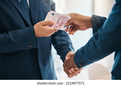 Handshake, money and business for corruption, sale transaction and pay worker with cash. Closeup, corrupt male hands and bribery for illegal service, bribe for contract agree and unlawful wealth. - Shutterstock ID 2219077571
