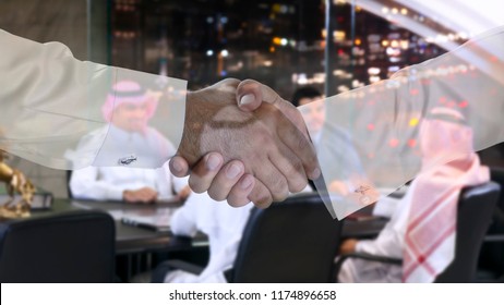 Handshake Multi Exposure With Saudi Arab Businessmen Meeting In The Background