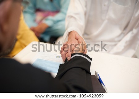 Similar – Female doctor filling out a questionnaire to senior patient