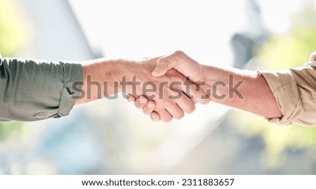 Handshake, partnership and trust in care for support, retirement or agreement in deal, greeting or commitment. Hand of people shaking hands for love or teamwork together against a blurred background