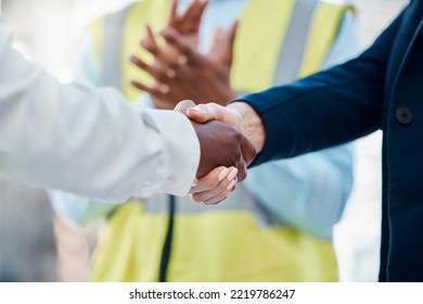 Handshake, success deal or partnership for construction worker, building engineer or architect finance, sales or investment funding. , men or architecture woman in agreement on real estate goals - Powered by Shutterstock