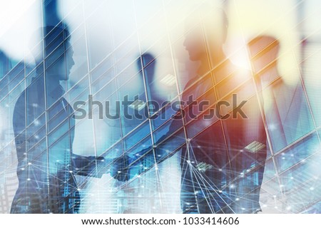 Handshaking business person in office with network effect. concept of teamwork and partnership. double exposure