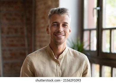 Handsome 30s businessman or employee, head shot. Blond stylish guy posing indoor smiling staring at camera feel optimistic. Professional occupation person, career growth, freelancer portrait concept - Shutterstock ID 2156291093