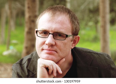 Handsome 35 Years Old Man With Glasses Outdoors