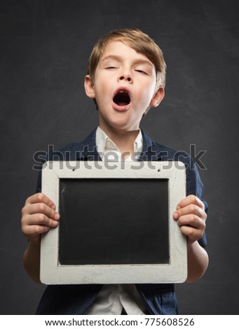 Similar – surprised boy with a blackboard