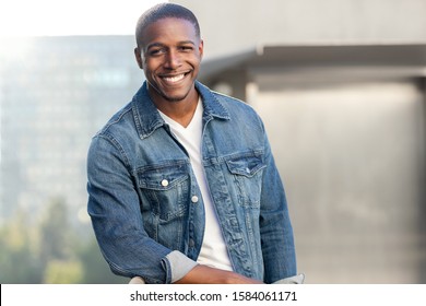 Handsome african american male portrait, cool trendy relaxed attire, living lifestyle headshot