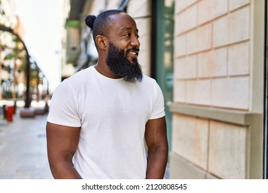 Handsome African American Man With Beard Wearing Casual White T Shirt Outdoors On A Sunny Day