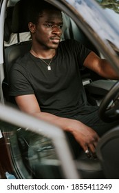 Handsome African American Man Driving A Car