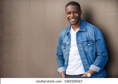 Handsome african american man model, good looking smiling casual lifestyle portrait in trendy clothing - Powered by Shutterstock