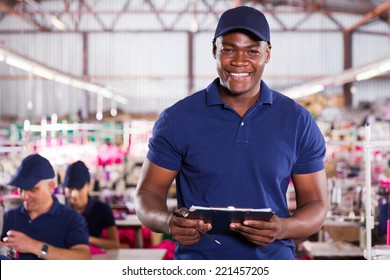 Handsome African American Textile Worker Holding A Clipboard