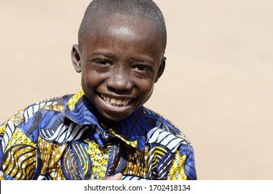 Handsome African Boy Happy and Joyful About Washing his Hands with Soap, Sanitizer and Water as a Health Symbol
