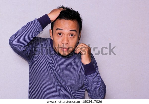 Handsome Asian Man Touching His Hair Stock Photo Edit Now 1503417026