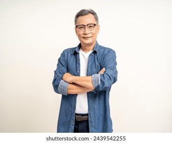 Handsome asian mature old man standing arm crossed on isolated white background. Happy Portrait of cheerful smiling senior asian man looking at camera. Mature People and lifestyle - Powered by Shutterstock