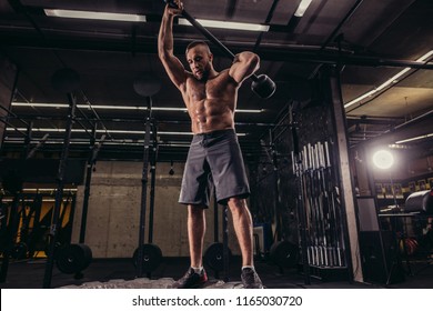 A Handsome Awesome Man Is Developing Power With Sledgehammer Workout.