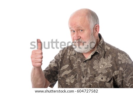 Handsome bald and bearded senior man shows thumbs upgesture, isolated on white background