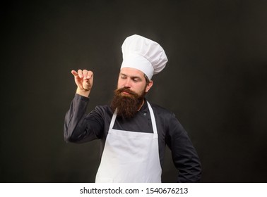 Chef mature man cook wear apron in kitchen. Handsome man preparing food in  kitchen. Guy cooking a tasty meal. Man on kitchen with meat and vegetables  Stock Photo - Alamy