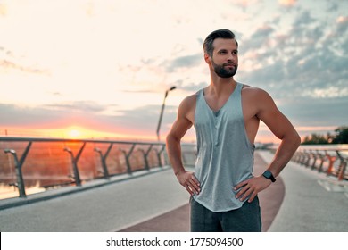 Handsome bearded man doing sport on the street. Morning run - Powered by Shutterstock