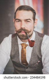 Handsome Big Moustache Hipster Man Smoking Pipe In The City