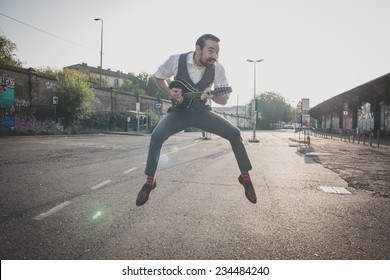 Handsome Big Moustache Hipster Man Playing Mandolin In The City