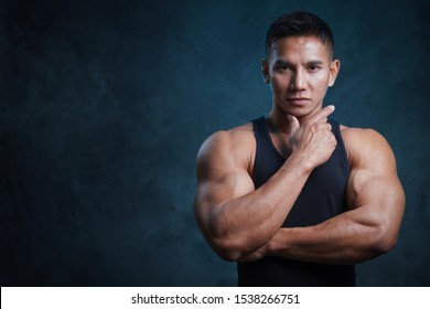 Handsome Big Muscles Man Posing At Studio.