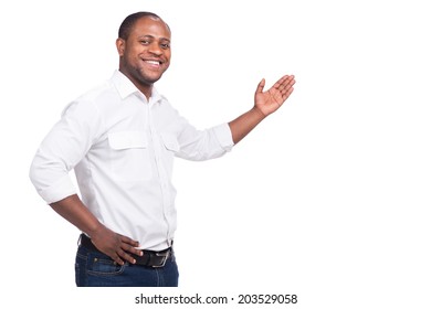 Handsome Black Man Standing And Smiling. Man Raised Left Hand Palm