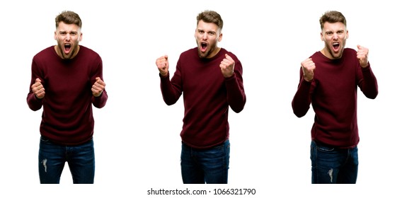 Handsome blond man happy and excited celebrating victory expressing big success, power, energy and positive emotions. Celebrates new job joyful isolated over white background - Shutterstock ID 1066321790