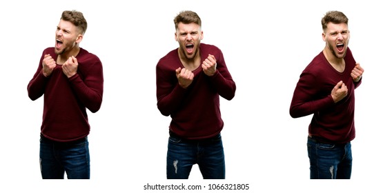 Handsome blond man happy and excited celebrating victory expressing big success, power, energy and positive emotions. Celebrates new job joyful isolated over white background - Shutterstock ID 1066321805